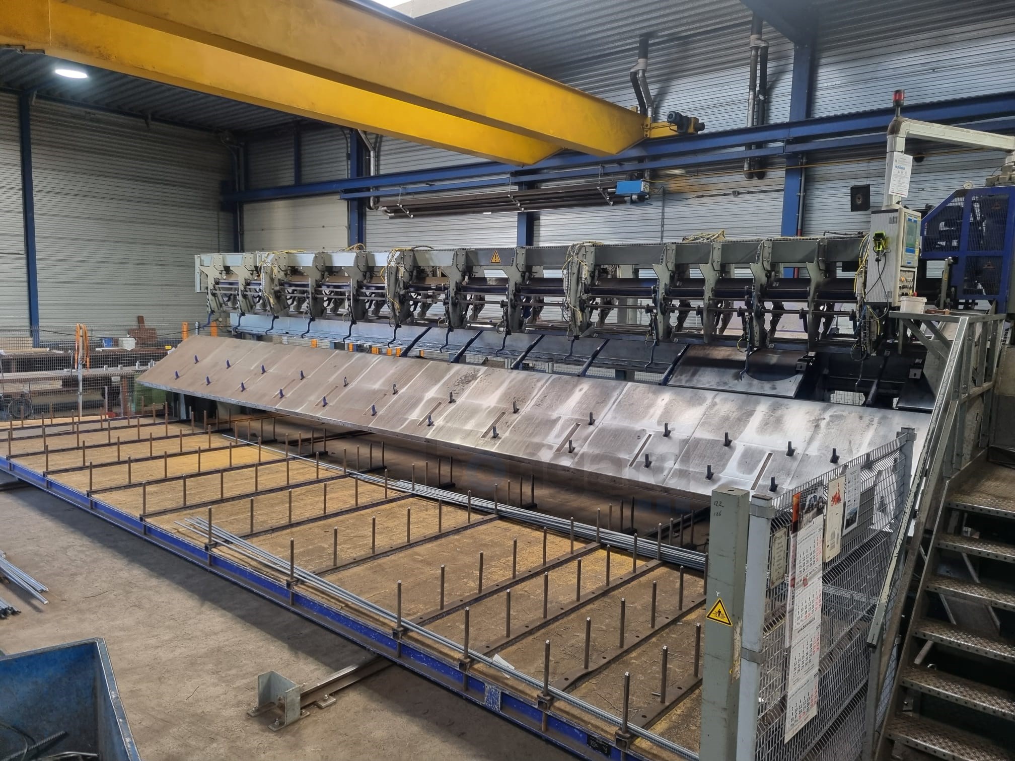 EVG DBE 28 Flexible processing centre for fully automatic cutting and bending of steel bars
