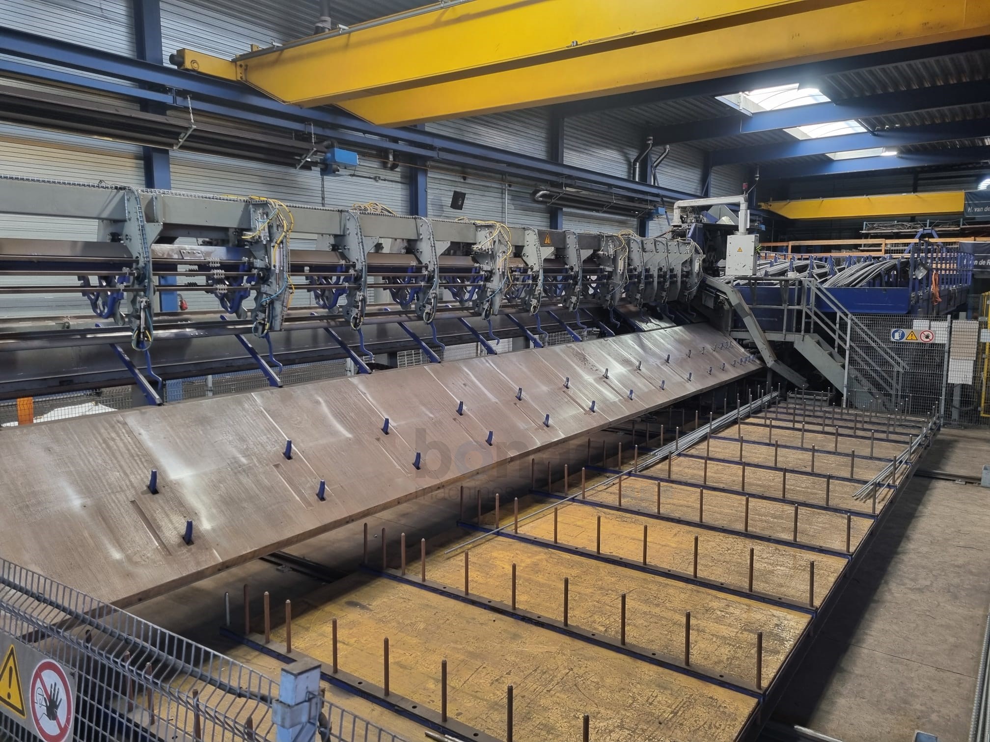 EVG DBE 28 Flexible processing centre for fully automatic cutting and bending of steel bars
