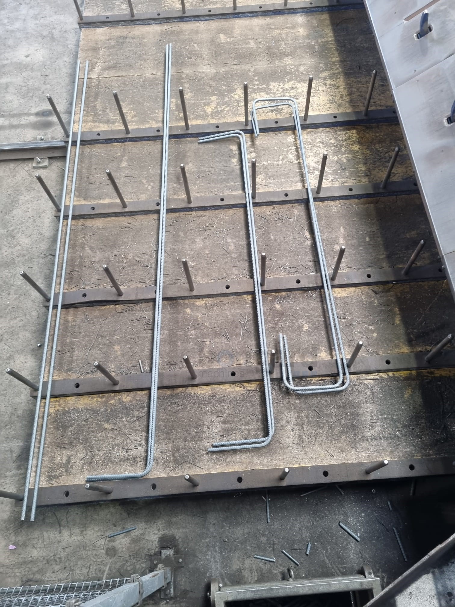 EVG DBE 28 Flexible processing centre for fully automatic cutting and bending of steel bars